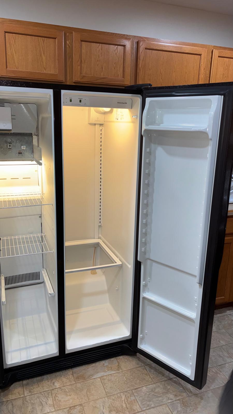 Clean refrigerator shelves and interior