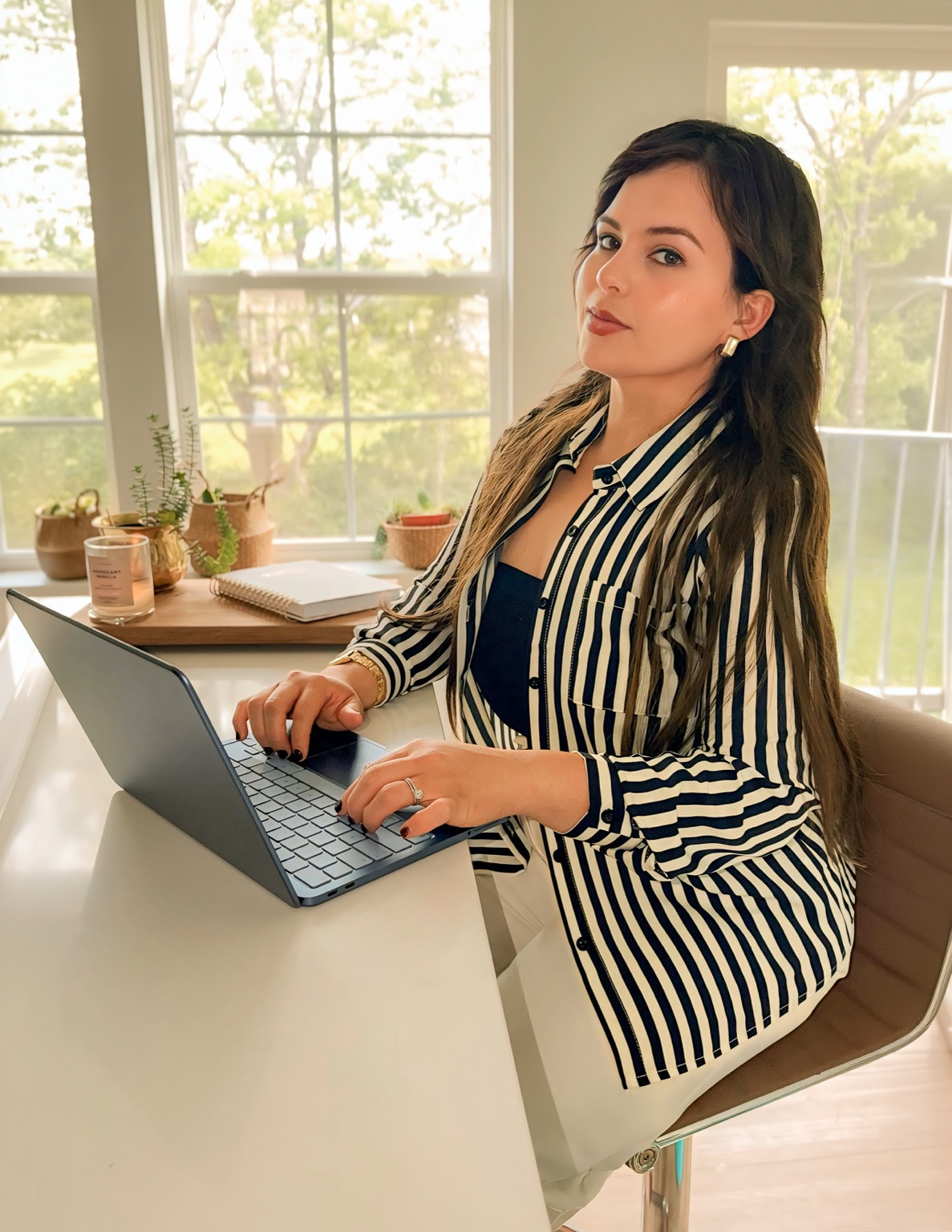 A Hope Cleaning team member seated at a laptop